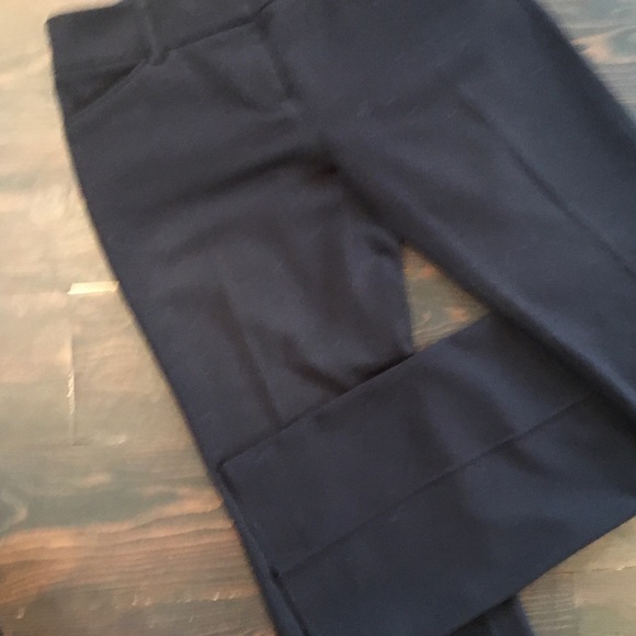 Black pant suit. Fitted jacket and straight leg pants with a slight boot cut. - Picture 6 of 10